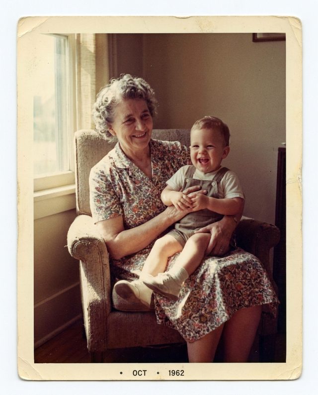 A 1962 photograph of a grandmother holding her toddler grandchild, coming to life