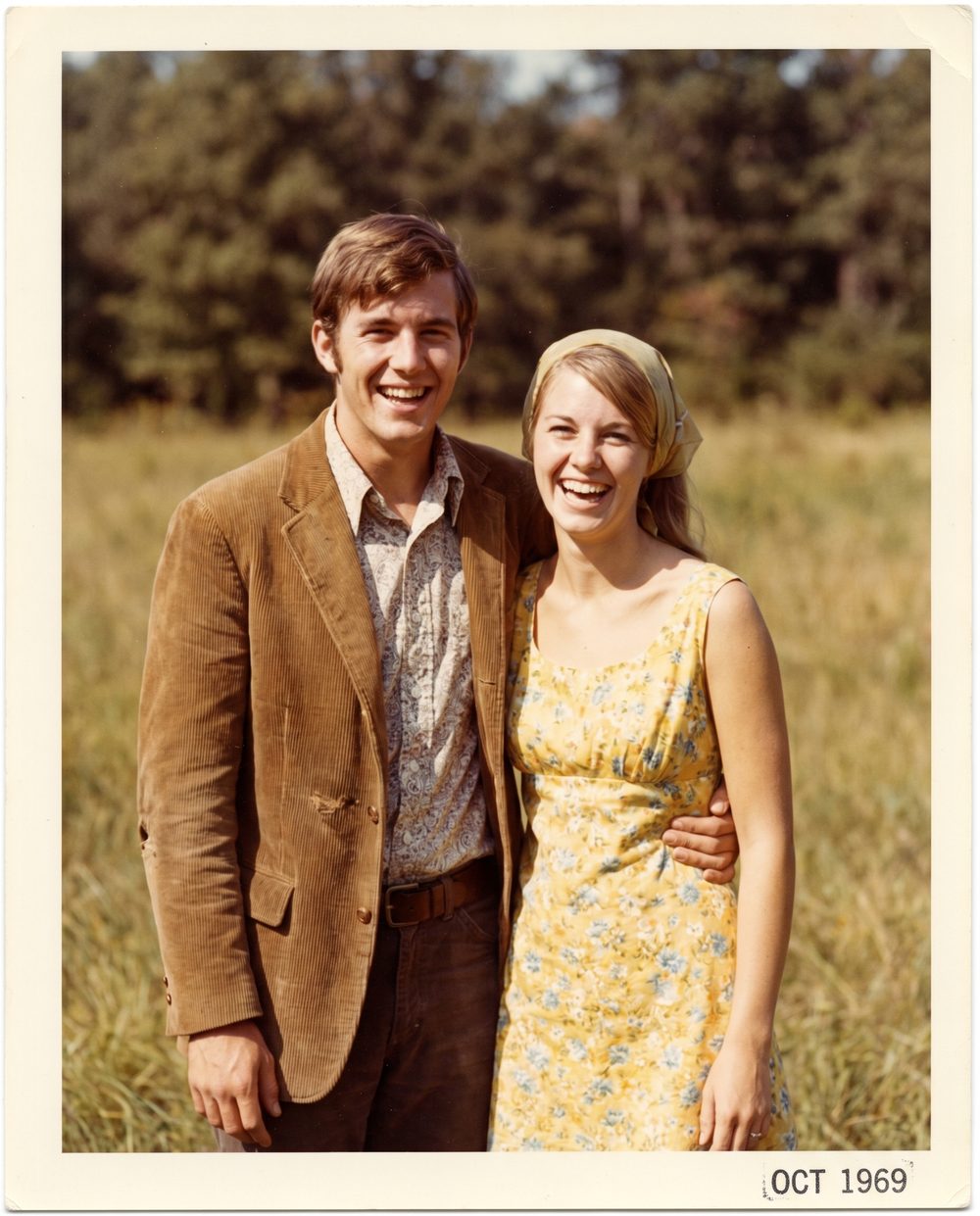 A 1969 photograph of a smiling young couple, restored to vivid, sharp color